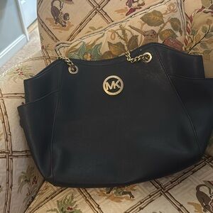 Michael Kors, black and gold purse